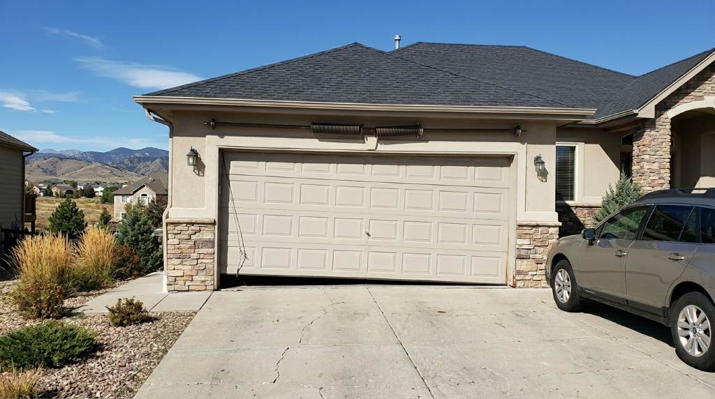 What Causes a Garage Door to Sit Unevenly in Denver, CO Properties