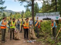 Volunteers cleaning up a trail on National Public Lands Day September 26 2026