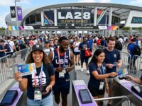 Fans entering an LA28 Olympic venue with tickets ready for admission