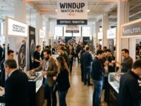 Visitors browsing watch brand booths at the Windup Watch Fair inside Center415 in New York City